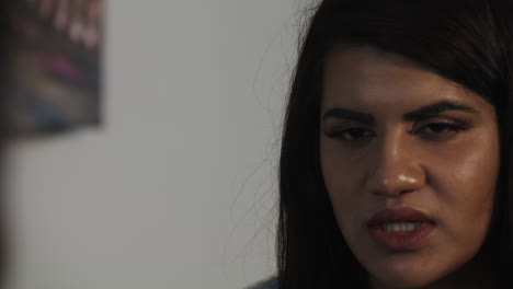 close up of a woman in a serious conversation