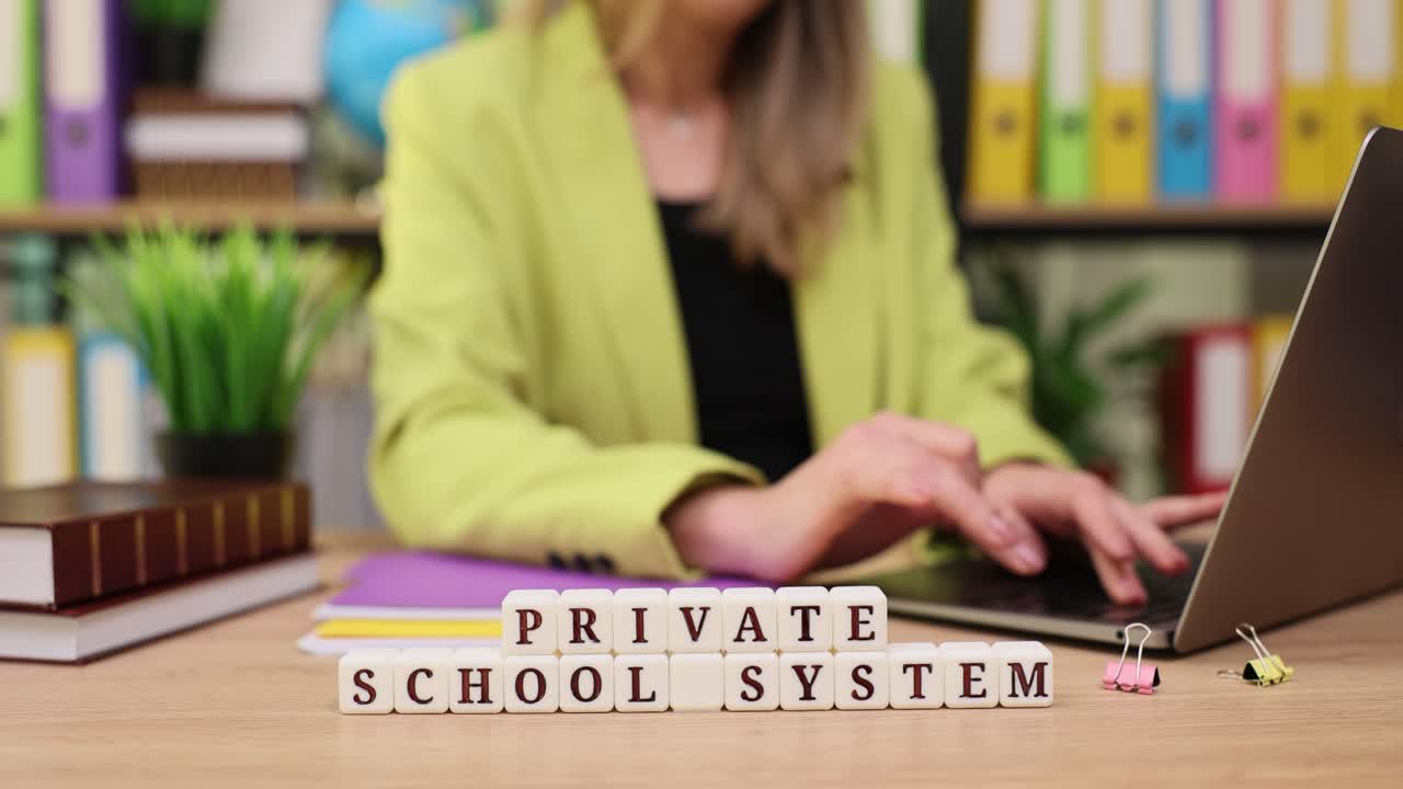 Private School System - Working at Desk