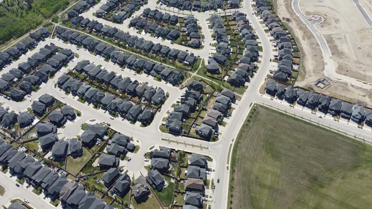 Aerial view of a suburban neighbourhood in Calgary, Alberta in summer.