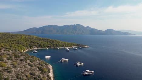 flying over agistri island with aegina island in distance