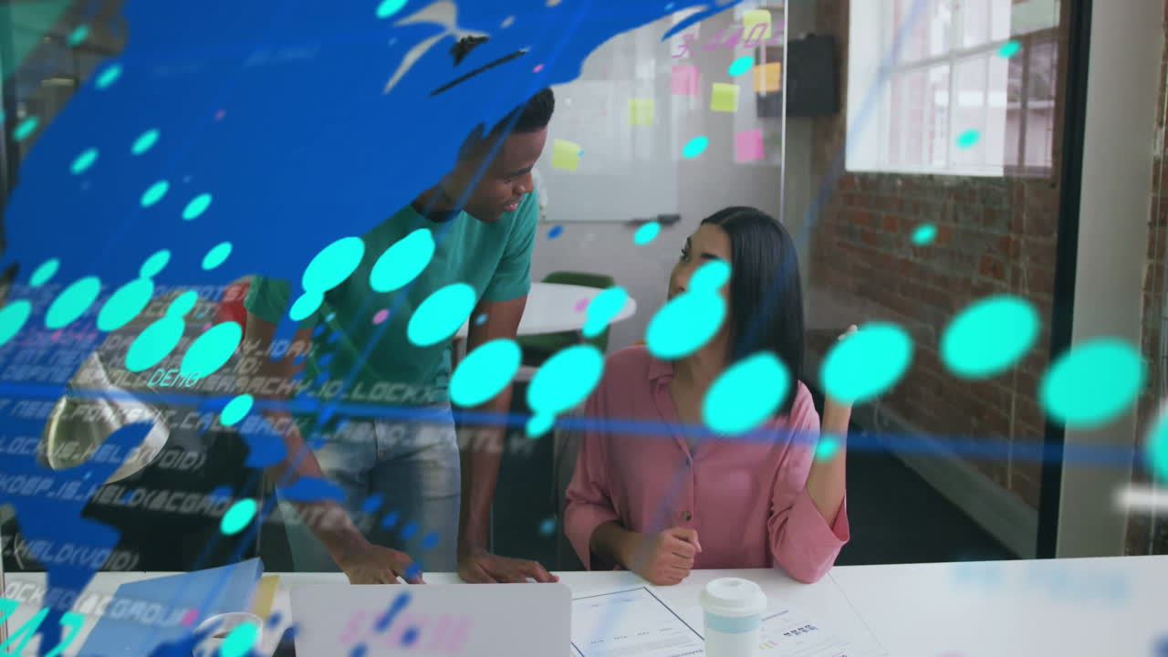 Business team collaborating at office desk with digital data animation overlay