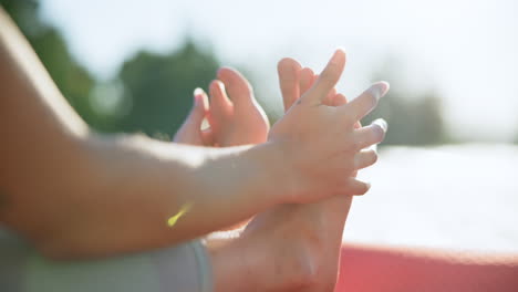 woman, hands and legs in pilates