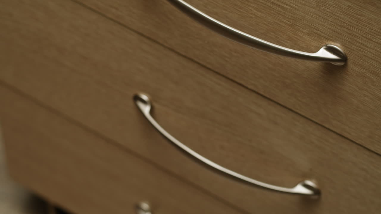 Young woman trying to untangle many various of wires close-up. Tangled wires and cables on table. Trying to untangle many messy and chaos cables