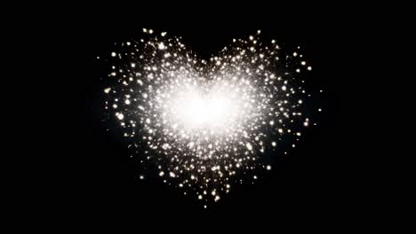 A heart-shaped burst of sparkling light particles on a black background