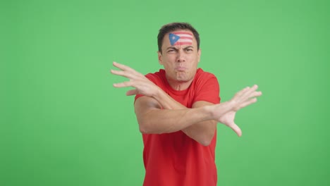 man cheering for puerto rico, angry with the decision of referee
