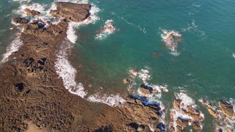 Rocky-ocean-shoreline-near-the-popular-seaside-town-of-Jaco-on-the-coast-of-Costa-Rica