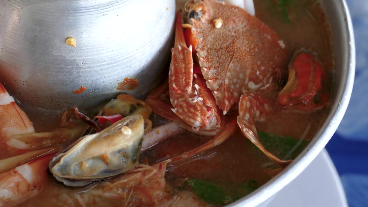 Seafood Spicy Tom Yum Soup in Hot Pot, Close Up