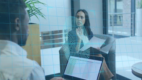 animation of fingerprint over diverse business people in office