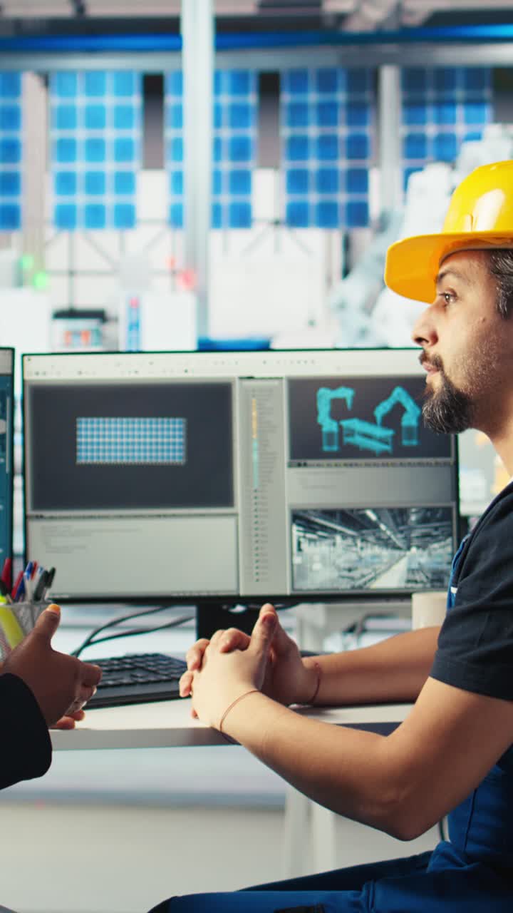 Vertical Video Photovoltaics Factory Manager Chatting With Engineer About Energy Production
