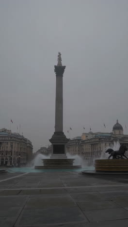 trafalgar square in london on a cloudy day
