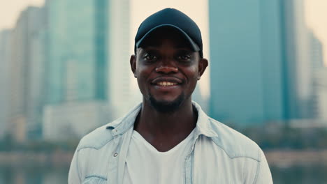 smiling man in cityscape