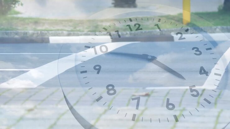 Animation of moving clock and sky with clouds over cars on street