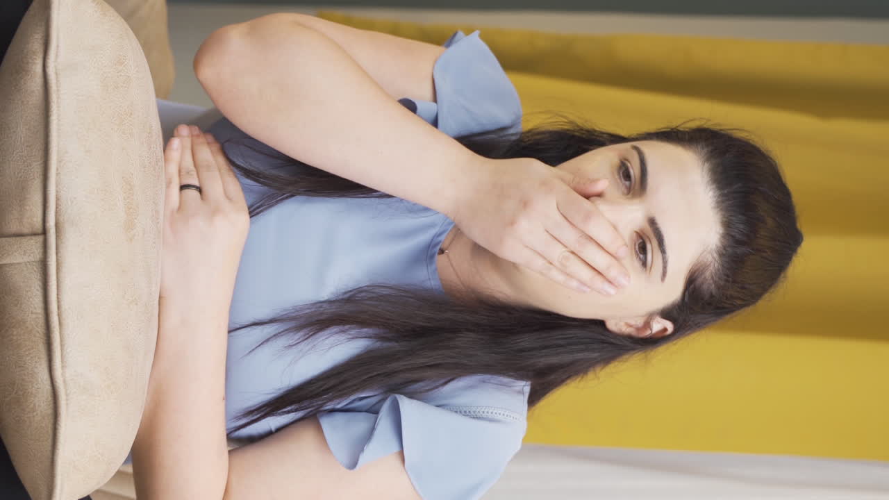 Vertical video of Woman with nausea.