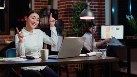 cheerful worker dancing, celebrating finishing company project