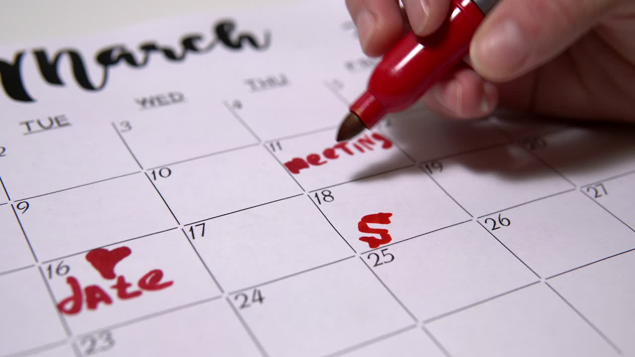 The girl marks the day of the workout on the calendar.