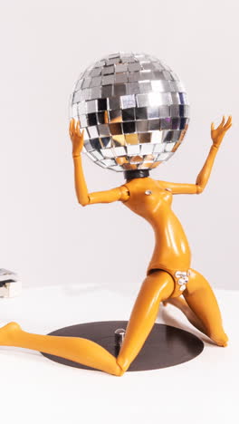 discodoll dancing on turntable