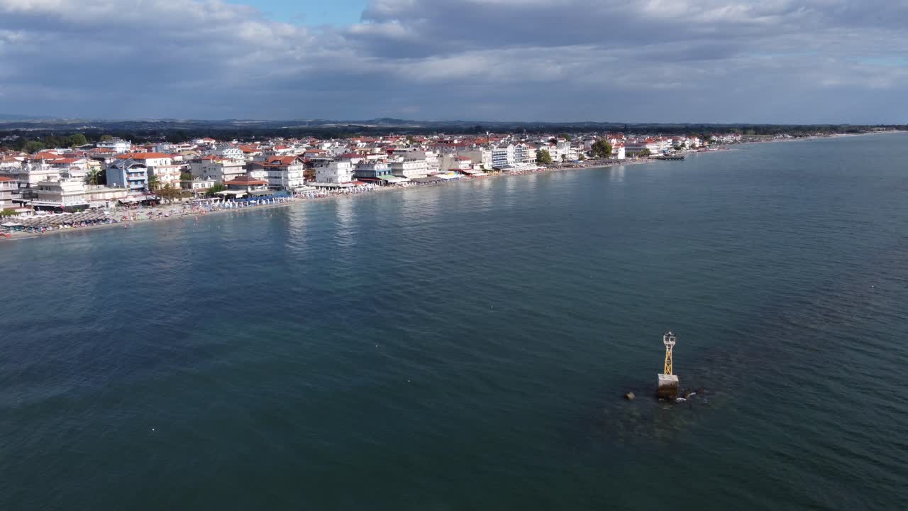Aerial approach the the beach resort of Paralia Katerini, Greece, close to the Olympus mount.