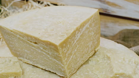 a piece of mouth-watering parmesan cheese hard cheeses