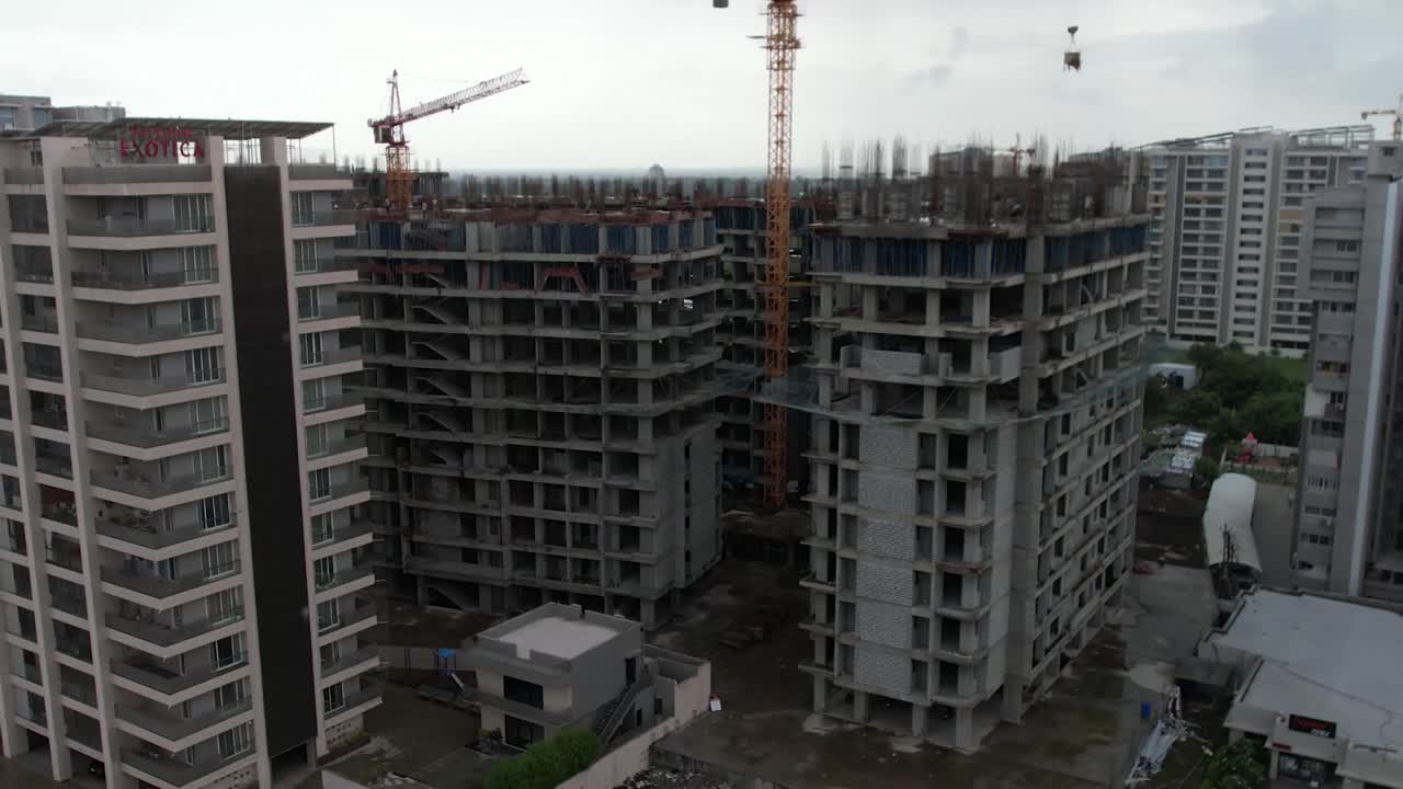 HIGH RISE BUILDING is visible in the drone camera