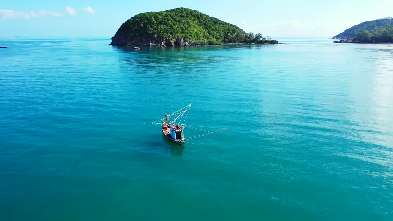 Fishing boat near a tropical island