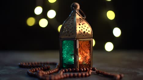 arabic lantern and tasbih (prayer beads beads)