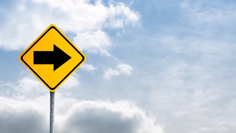 Animation-of-road-sign-and-clouds-on-blue-background