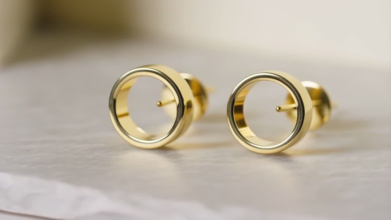 Pair of Golden Circular Stud Earrings