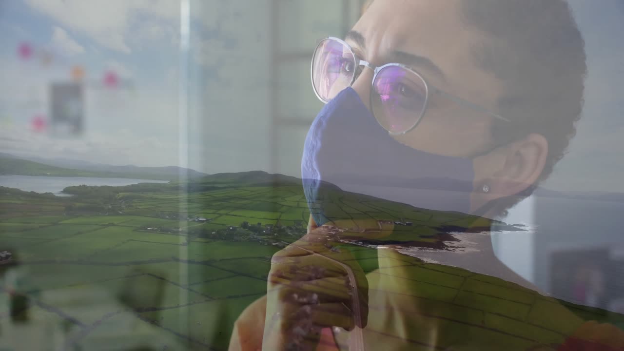 Opening closeup woman wearing glasses blue mask resting chin revealing coastal overlay for health
