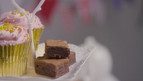 studio shot of traditional british afternoon tea with sandwiches cake scones cream and jam 5