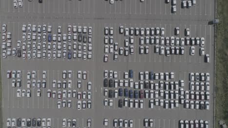 aerial view of new car storage parking lot. car park view from above.