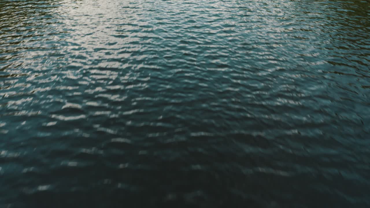 Ripples Of The River In El Paredon, Guatemala - drone shot