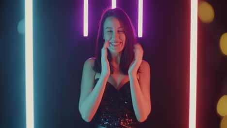 happy woman under neon lights