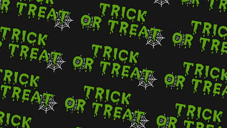 green trick or treat toxic text with spiders web in night