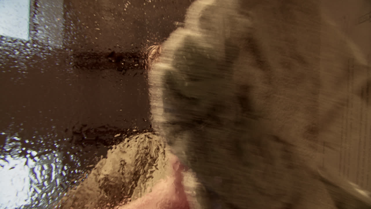 Changing Perspectives: Man Behind Wet Glass