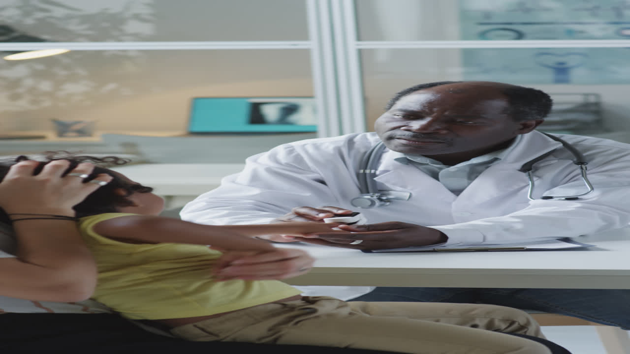 Doctor Consulting Mother and Little Kid