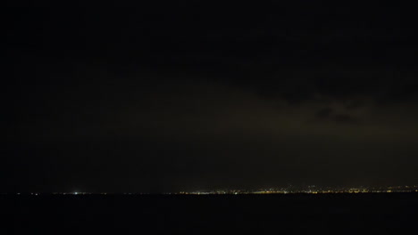 lightnings in night sky over the city