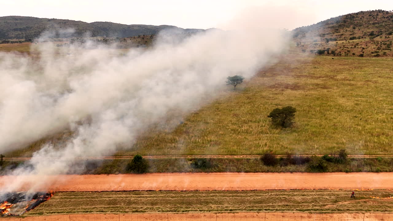 Planned agricultural burn reduces fuel load on farmland from seasonal wildfires