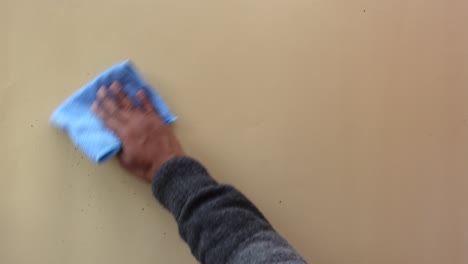 cleaning up a mess with a cloth