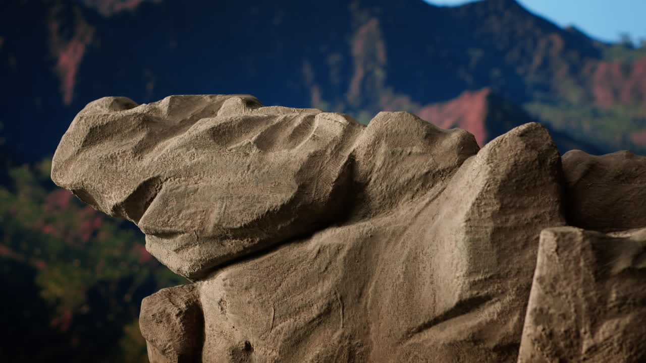 majestuoso paisaje montañoso con picos altísimos y un primer plano rocoso