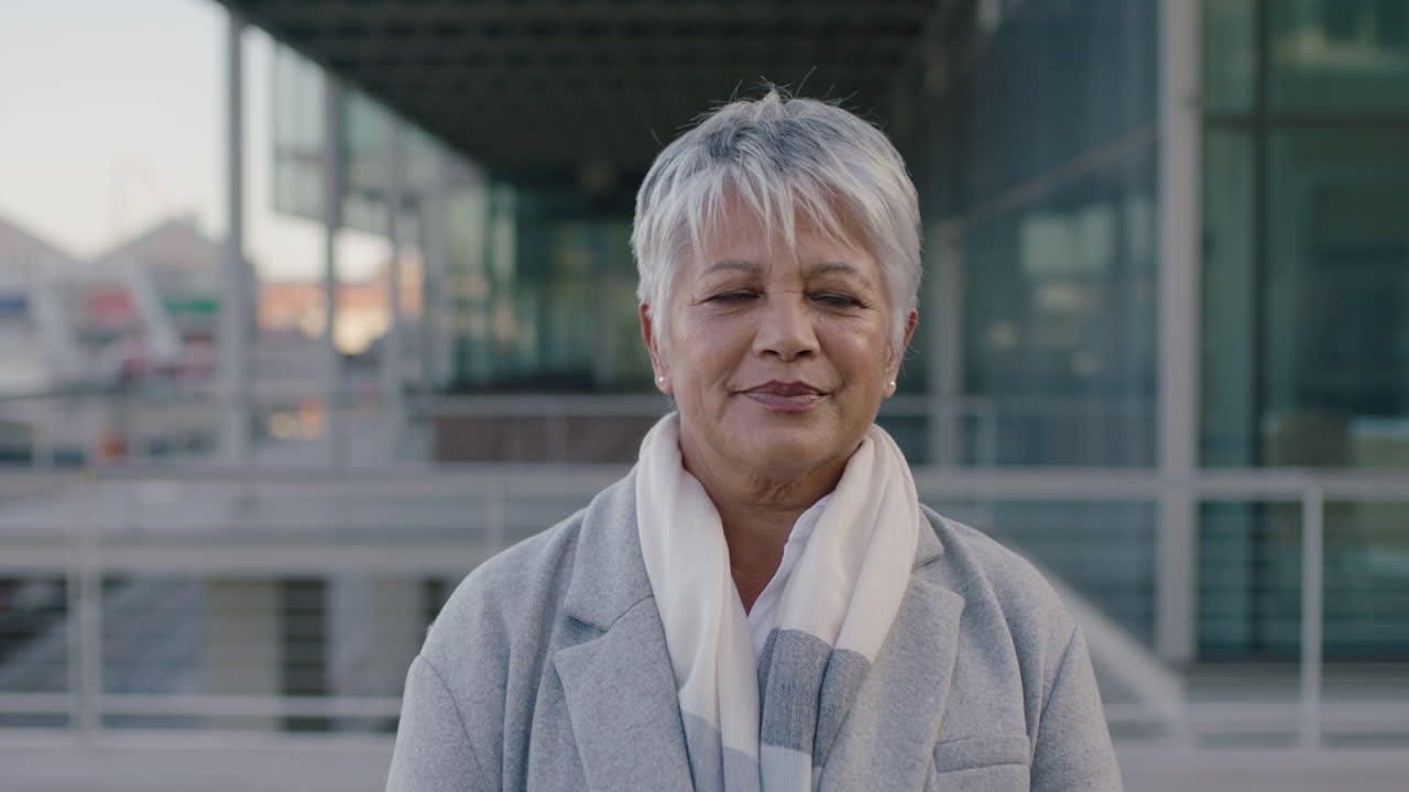 successful middle aged woman portrait standing in city proud business woman education professional