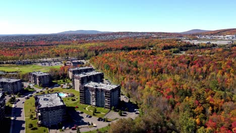 experience breathtaking views of a hotel complex nestled near a serene golf course, captured by a mesmerizing drone flyover video