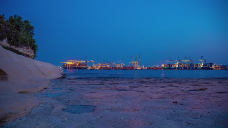 Major-transport-shipping-hub-on-the-island-of-Malta---twilight-to-nighttime-time-lapse