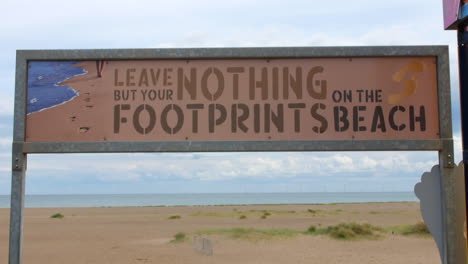 beach conservation sign leave nothing but your footprints on the beach