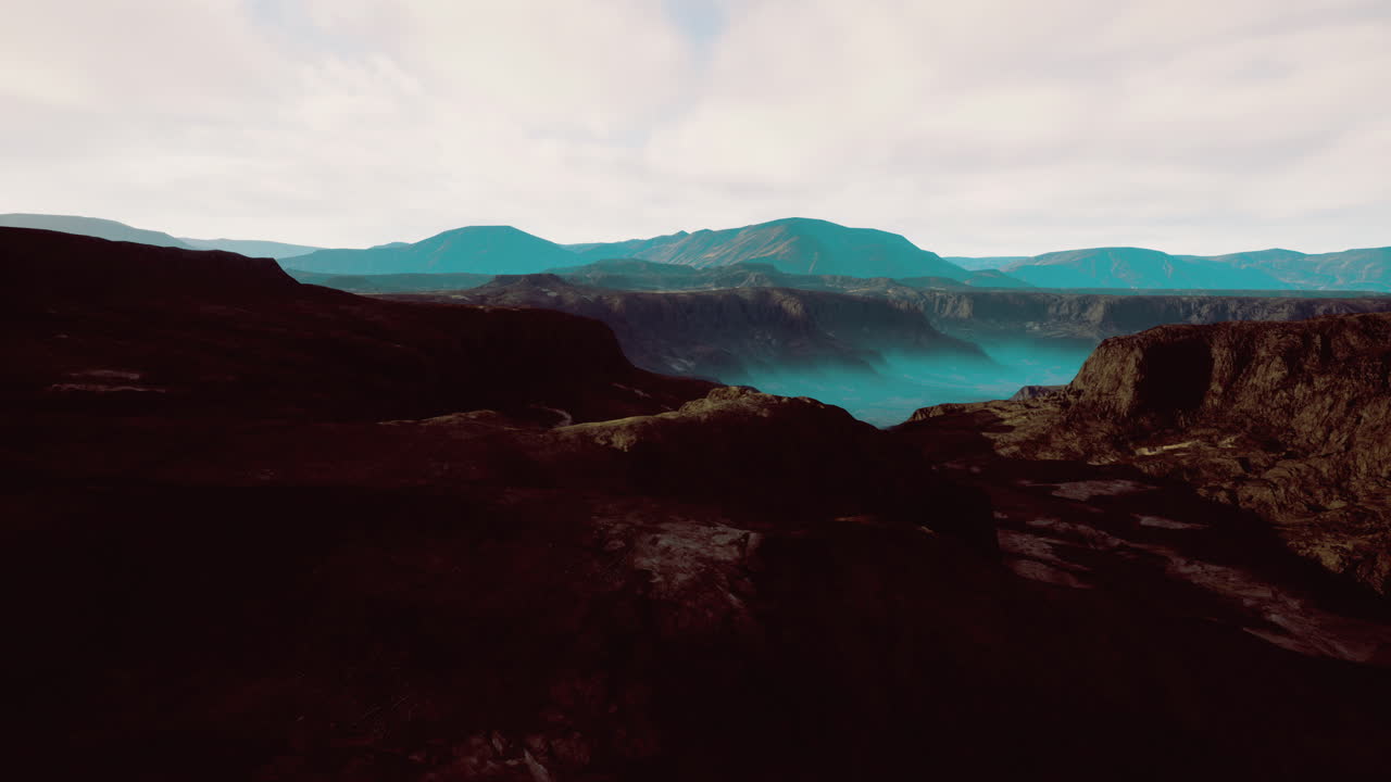 majestuoso paisaje montañoso bajo nubes suaves y cielos azules durante el día