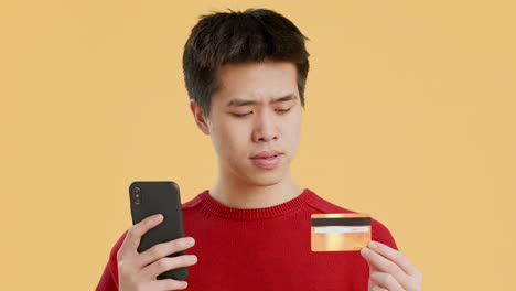 young man confused about online payment