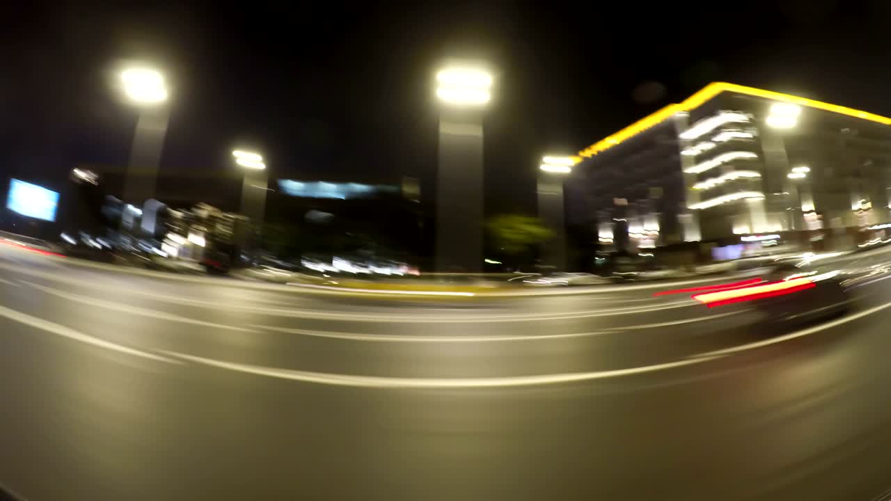 viaje rápido por la ciudad noche carretera timelapse vista lateral loopable