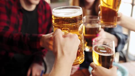 friends toasting with beer