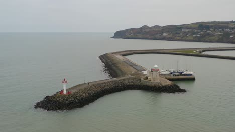 wide aerial orbit of howth lighthouse