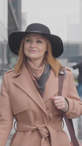 woman walking in the city in winter