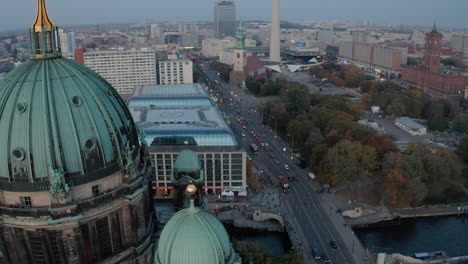 Tilt-up-reveal-of-centre-of-town-with-landmark,-Fersehturm-and-Rotes-Rathaus.-View-by-Berlin-Cathedral.-Berlin,-Germany.